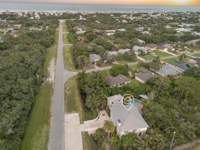 bird's eye view with a residential view and a water view