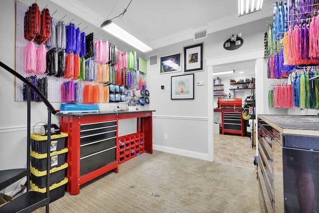 interior space featuring a workshop area and visible vents