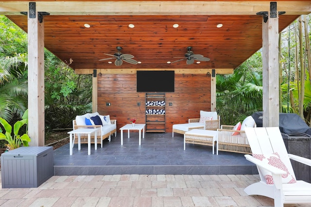 view of patio / terrace with a ceiling fan and outdoor lounge area