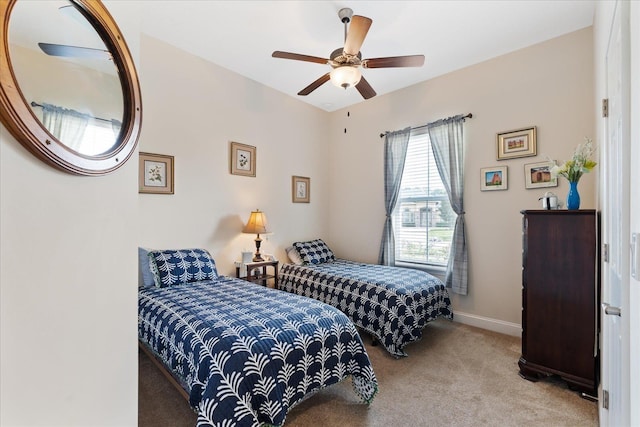 552 Christina Dr, Saint Augustine, FL 32086 - carpeted bedroom featuring baseboards and a ceiling fan