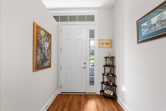 552 Christina Dr, Saint Augustine, FL 32086 - entrance foyer with wood finished floors, baseboards, and visible vents