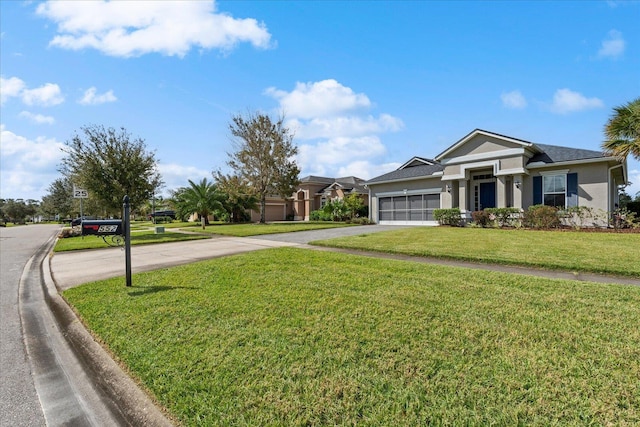 552 Christina Dr, Saint Augustine, FL 32086 - view of front facade featuring a front yard, stucco siding, concrete driveway, and a garage