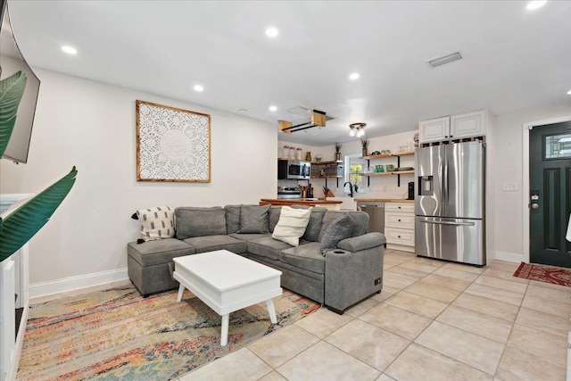 56 Dumas St, Saint Augustine, FL 32084 - living room featuring visible vents, recessed lighting, and light tile patterned floors
