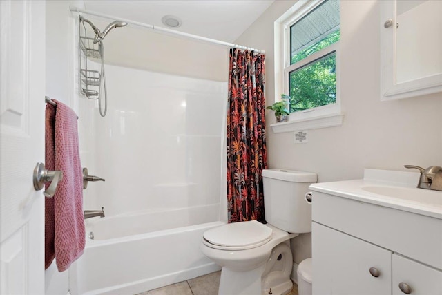 56 Dumas St, Saint Augustine, FL 32084 - bathroom with toilet, vanity, tile patterned floors, and shower / bath combo with shower curtain