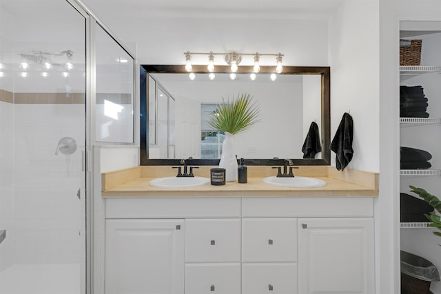 bathroom featuring vanity and walk in shower