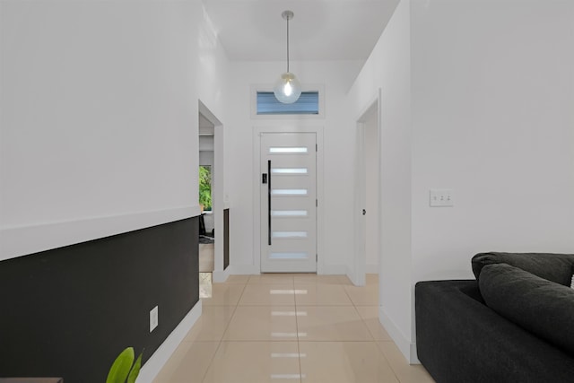 entryway featuring light tile patterned flooring