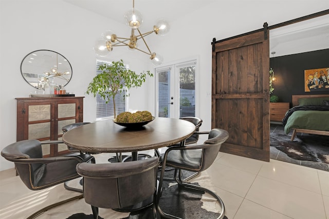 dining room with french doors, a barn door, a chandelier, and light tile patterned floors