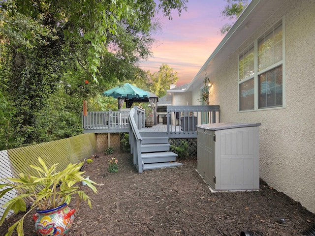 view of yard featuring a wooden deck