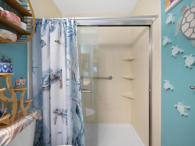 full bathroom featuring a stall shower