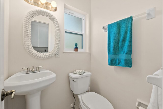 10 Marshview Dr, Saint Augustine, FL 32080 - half bath featuring toilet and a sink