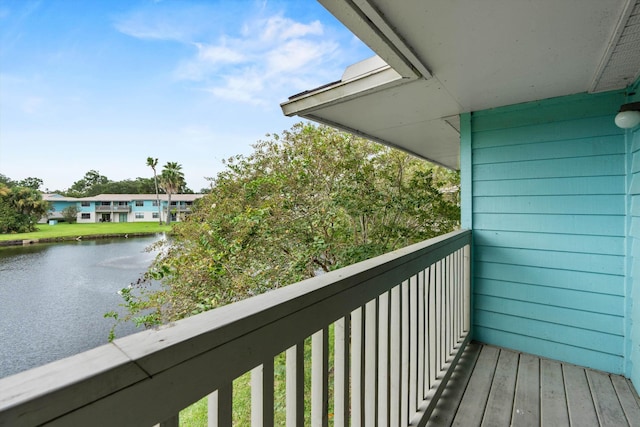 balcony featuring a water view