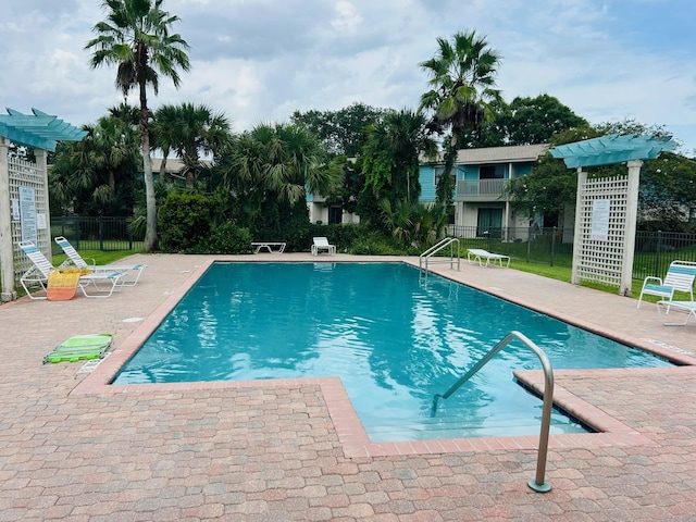 view of swimming pool featuring a patio