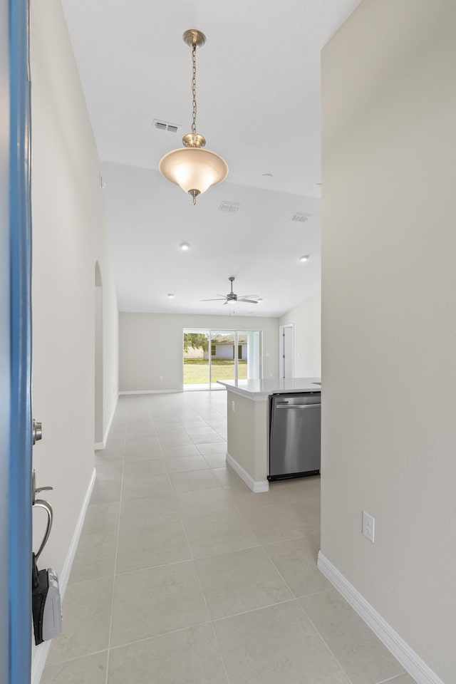 hallway with light tile patterned floors