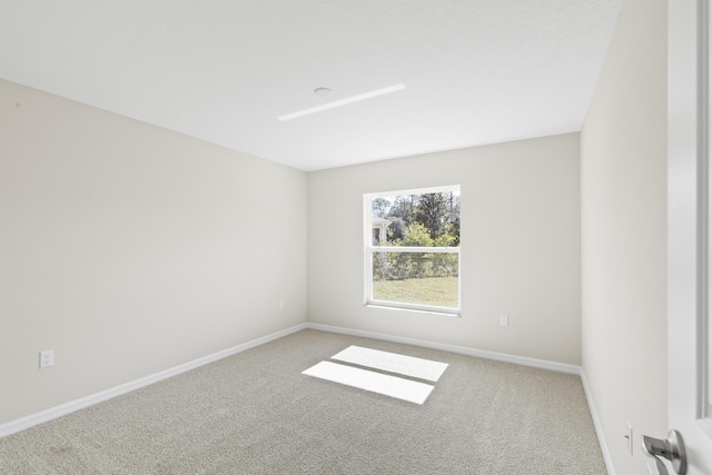 unfurnished room with carpet floors