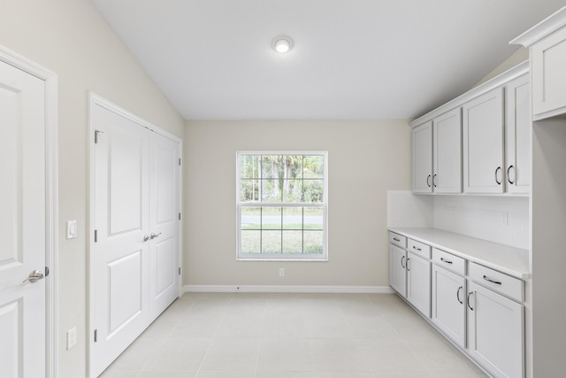 kitchen with light tile patterned floors