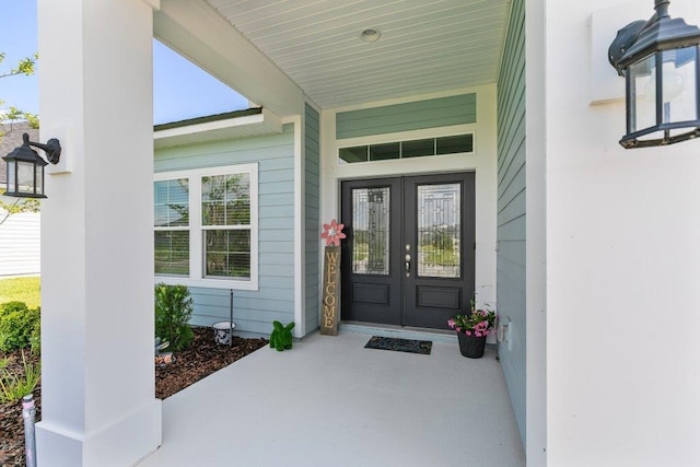 66 Magdaleno Ct, Saint Augustine, FL 32092 - view of exterior entry featuring french doors and a porch
