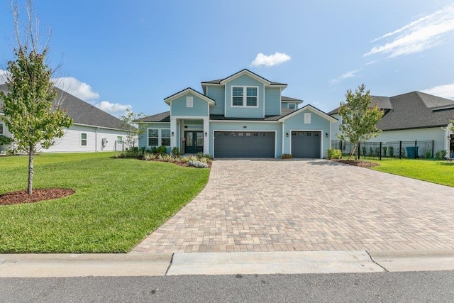 66 Magdaleno Ct, Saint Augustine, FL 32092 - view of front of house with decorative driveway and an attached garage