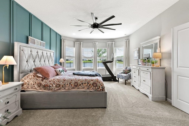66 Magdaleno Ct, Saint Augustine, FL 32092 - bedroom with light colored carpet, a textured ceiling, and ceiling fan