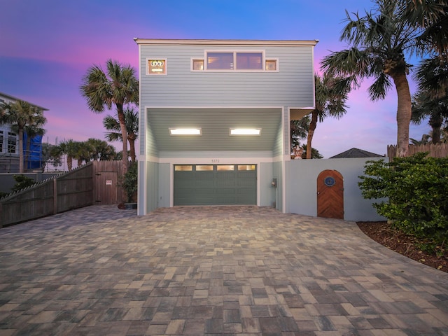 view of front of home with a garage