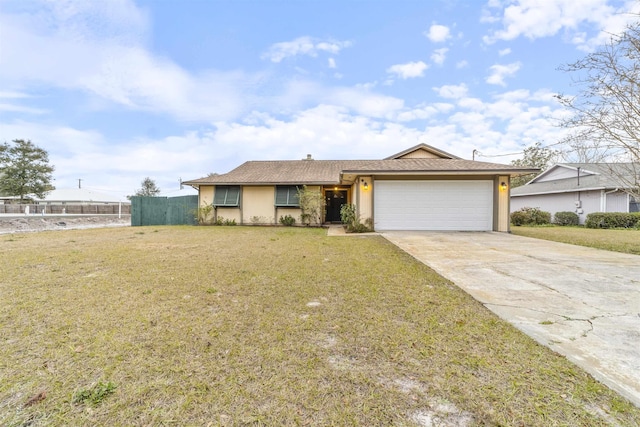 single story home featuring a garage and a front yard