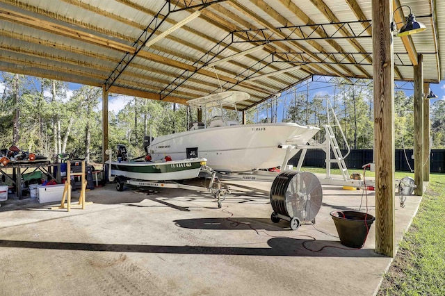 view of vehicle parking featuring a carport