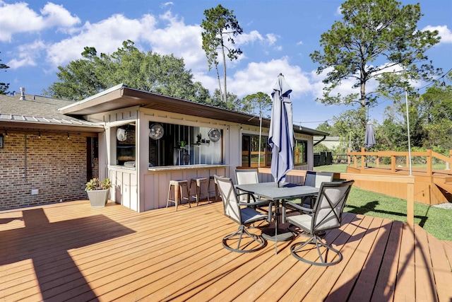 wooden terrace with exterior bar