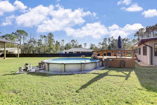 view of yard featuring a fenced in pool