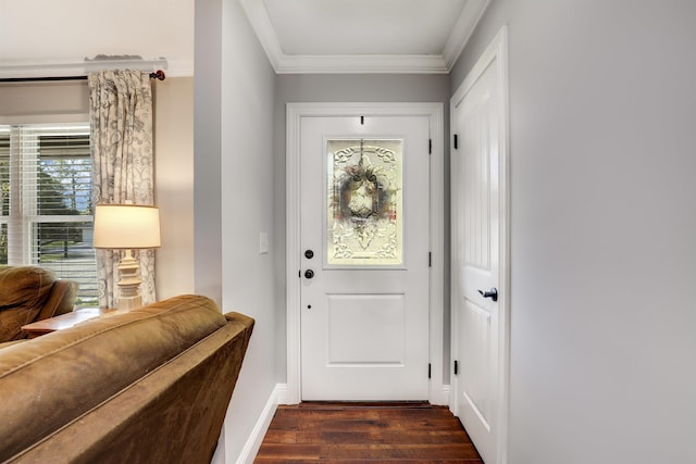 doorway featuring crown molding and dark wood-type flooring