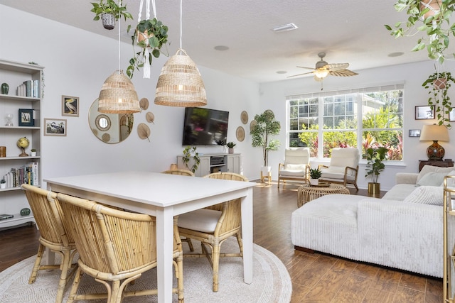 1036 Saltwater Cir, Saint Augustine, FL 32080 - dining room with a ceiling fan and dark wood finished floors