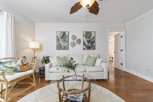 1036 Saltwater Cir, Saint Augustine, FL 32080 - living room with ceiling fan, wood finished floors, and a textured ceiling