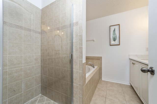 1036 Saltwater Cir, Saint Augustine, FL 32080 - full bath with a stall shower, vanity, a garden tub, and tile patterned floors