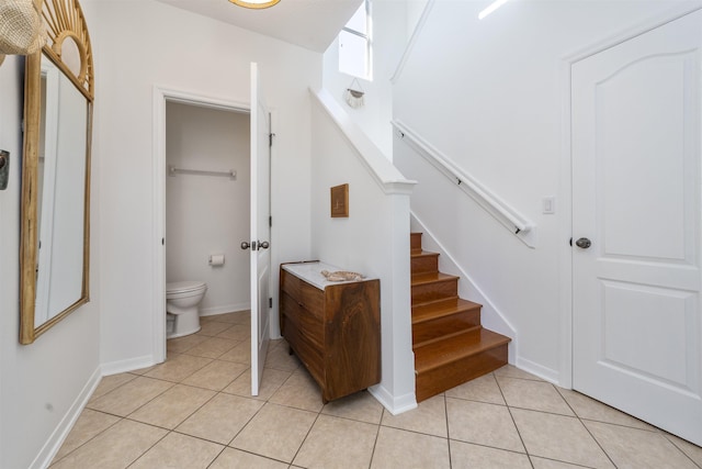 1036 Saltwater Cir, Saint Augustine, FL 32080 - staircase featuring tile patterned flooring and baseboards