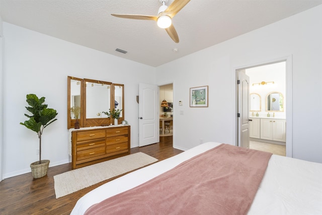 1036 Saltwater Cir, Saint Augustine, FL 32080 - bedroom with wood finished floors, ensuite bathroom, and ceiling fan
