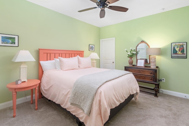 bedroom featuring ceiling fan and light colored carpet