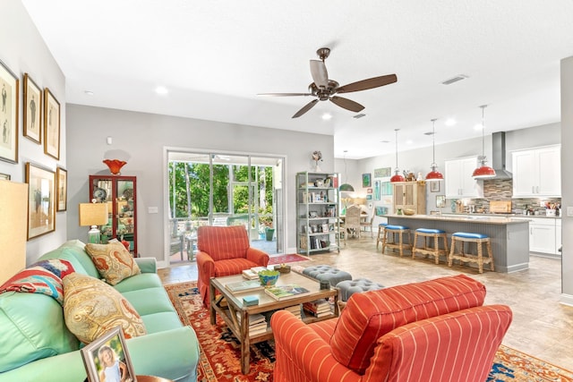 living room with ceiling fan