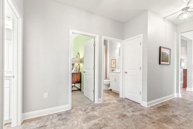 interior space featuring ensuite bath