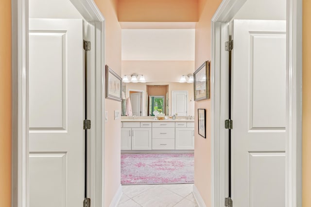 interior space featuring tile patterned floors and vanity