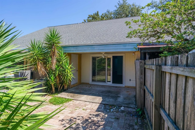 back of house with a patio