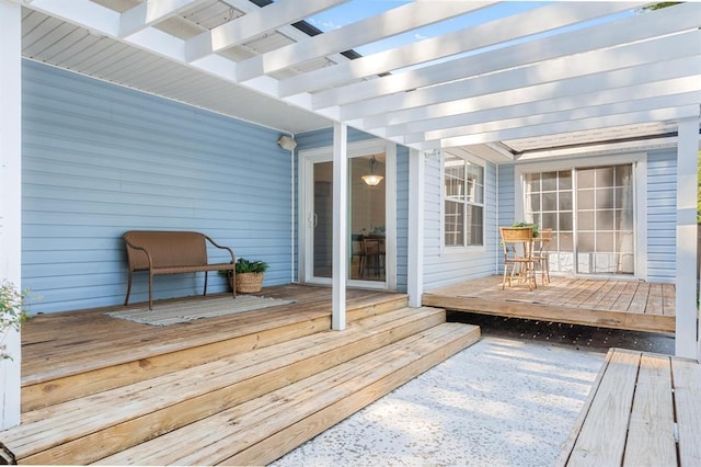 wooden deck featuring a pergola