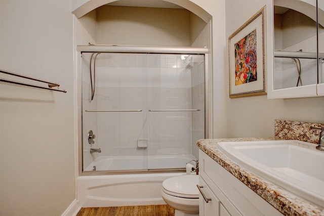 20102 Harbour Vista Cir, Saint Augustine, FL 32080 - bathroom with vanity, enclosed tub / shower combo, and wood finished floors