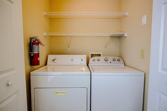 20102 Harbour Vista Cir, Saint Augustine, FL 32080 - laundry room with washing machine and clothes dryer
