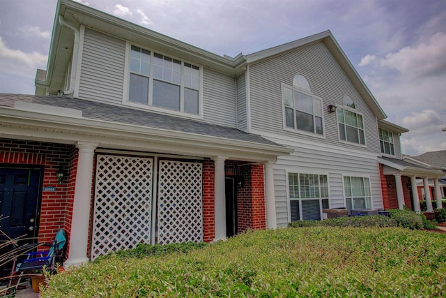 20102 Harbour Vista Cir, Saint Augustine, FL 32080 - view of front of property with brick siding and roof with shingles