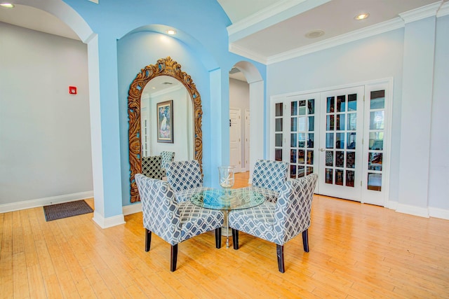 20102 Harbour Vista Cir, Saint Augustine, FL 32080 - dining room with arched walkways, hardwood / wood-style floors, crown molding, and recessed lighting