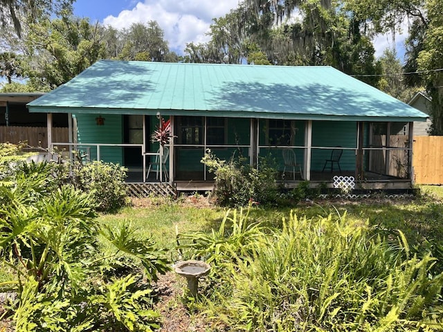 205 E Cochran Ave, Hastings, FL 32145 - view of front facade featuring metal roof and a porch