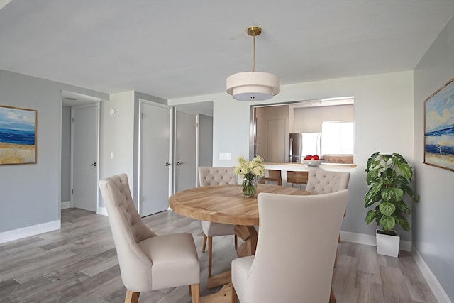 8550 S A1A # 331, Saint Augustine, FL 32080 - dining space with light wood-type flooring and baseboards
