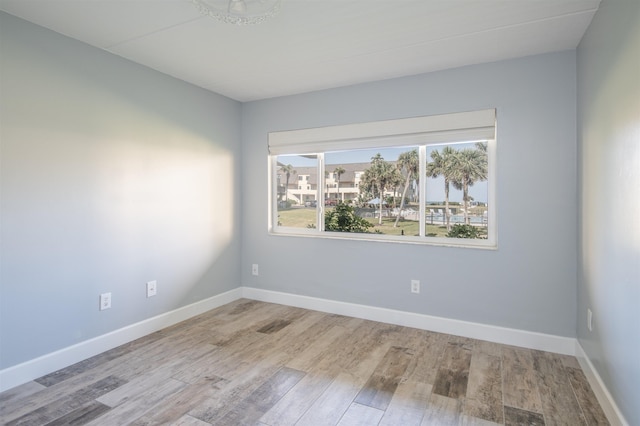 8550 S A1A # 331, Saint Augustine, FL 32080 - unfurnished room with wood finished floors and baseboards