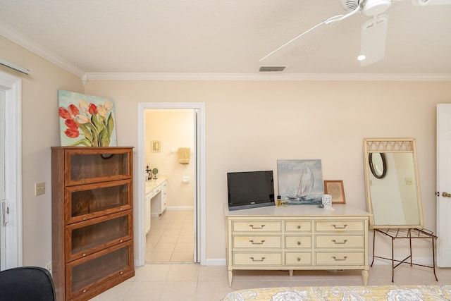 tiled bedroom with ceiling fan, crown molding, and ensuite bath