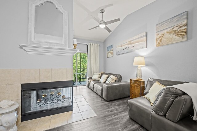 225 Old Village Center Cir Unit 4308, Saint Augustine, FL 32084 - living area featuring lofted ceiling, ceiling fan, wood finished floors, and a tile fireplace