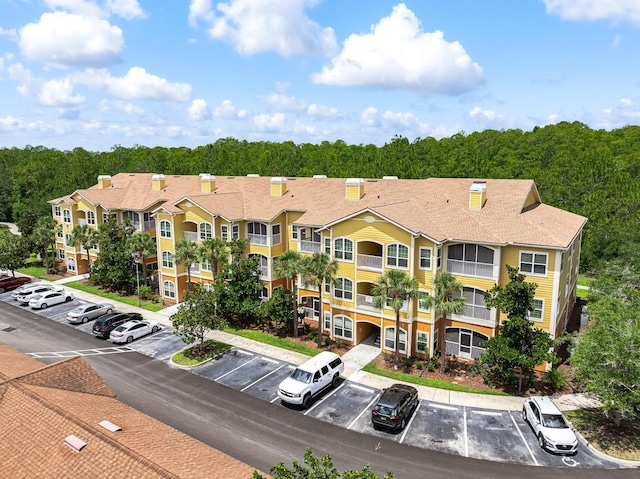 225 Old Village Center Cir Unit 4308, Saint Augustine, FL 32084 - view of apartment building / complex featuring uncovered parking