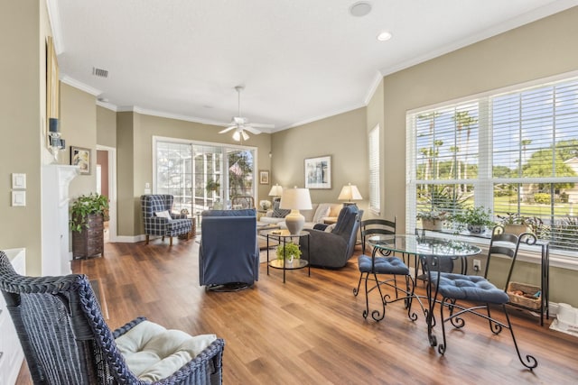 303 S Ocean Trace Rd, Saint Augustine, FL 32080 - living room featuring wood finished floors, ceiling fan, ornamental molding, recessed lighting, and baseboards